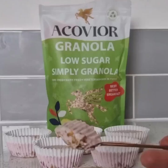 "Acovior's Low Sugar Simply Granola”: Perfect for a healthy breakfast, granola yogurt pots, and flapjack recipes. Nut-free, eco-packaged, and ideal for clean eating. Shop now for the best granola experience!" 